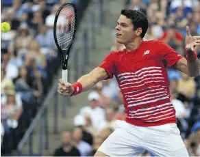  ?? VAUGHN RIDLEY / GETTY IMAGES ?? Milos Raonic plays a shot against Jared Donaldson during Raonic’s 6-2, 6-3 win at the Rogers Cup on Thursday in Toronto.