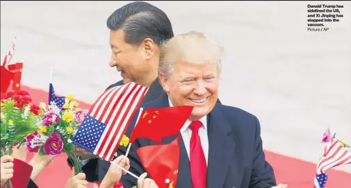  ?? Picture / AP ?? Donald Trump has sidelined the US, and Xi Jinping has stepped into the vacuum.