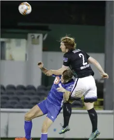  ??  ?? Hugh Douglas of Bray Wanderers gets above Aaron Drinan of Waterford FC.