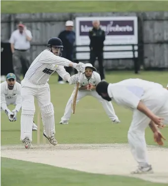  ??  ?? Hetton Lyons bowler Gary Adey has Whitburn batsman Ross Carty in all sorts of trouble on Saturday