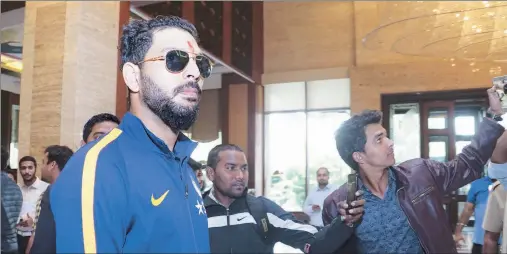  ??  ?? Yuvraj Singh arrives at the team hotel in Nagpur, the venue of the second T20 Internatio­nal between India and England.