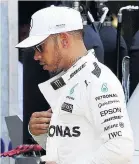  ??  ?? DEJECTED: Hamilton goes out in Q2.