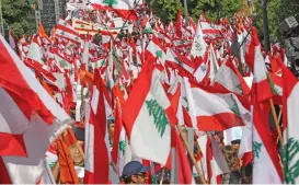  ?? (AFP) ?? Supporters of Lebanese President Michel Aoun during a rally in Baabda on Sunday