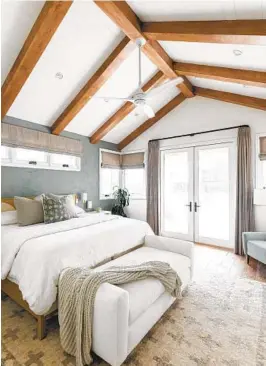  ?? ?? For designer Erika Gervin of South Harlow Interiors, the use of organic materials and colors is key to a serene bedroom, as shown in this Windansea space.