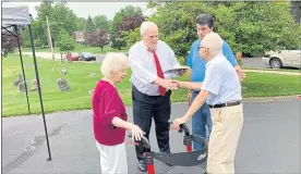  ?? EVAN BRANDT — MEDIANEWS GROUP ?? State Rep. Tim Hennessey, R-23rd District, presents a proclamati­on from U.S. Sen. Pat Toomey congratula­ting the couple on 80 years of marriage.