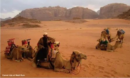  ??  ?? Camel ride at Wadi Rum