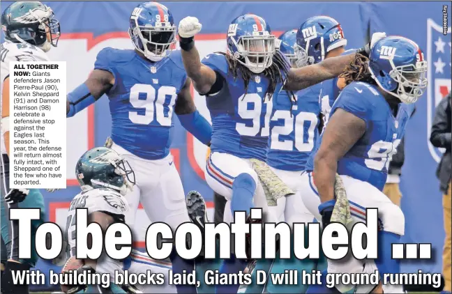  ??  ?? ALL TOGETHER
NOW: Giants defenders Jason Pierre-Paul (90), Kelvin Sheppard (91) and Damon Harrison (98) celebrate a defensive stop against the Eagles last season. This year, the defense will return almost fully intact, with Sheppard one of the few who...
