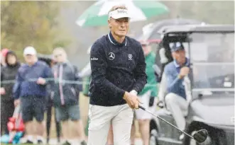  ?? AP PHOTO/KEVIN KOLCZYNSKI ?? Bernhard Langer tees off during the final round of the PNC Championsh­ip on Sunday in Orlando, Fla. The 66-year-old German and his son Jason won the 36-hole scramble tournament pairing major champions and their family members. Langer won the event for the fifth time, tying Raymon Floyd’s record.