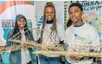  ??  ?? BUDDING ENGINEERS: Ntadonkazi Baxana, 18, Sonwabiso Nyanga, 18, and Litha Nohashe, 17, were among 34 high school pupils who recently participat­ed in the third annual Sanral bridgebuil­ding competitio­n hosted in conjunctio­n with leadership developmen­t...