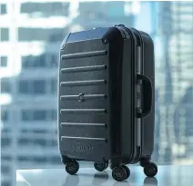  ?? — SOLGAARD ?? The Lifepack Carry-on Closet is a hard-sided spinner with a shelving system inside that expands and attaches to the handle.