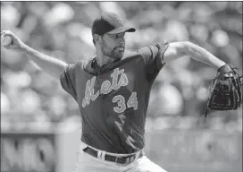  ?? PATRICK SEMANSKY / ASSOCIATED PRESS 2012 ?? Mike Pelfrey, who was a promising prospect for the New York Mets, is coming off Tommy John surgery and has agreed to a $4 million, one-year contract with the Minnesota Twins. Pelfrey was an innings eater during a four-year run with the Mets before...