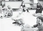  ?? MARY ALTAFFER/AP ?? Children in music class May 18 at an elementary school in Rye, New York. Back-to-school spending could top pre-pandemic levels, a key spending measure says.