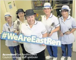  ??  ?? Accredited East Renfrewshi­re Council catering staff celebrate