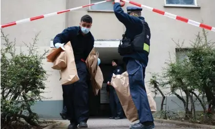  ?? Photograph: Clemens Bilan/EPA ?? Residents were told to leave their homes as the police and fire brigade helped clear nearby buildings.