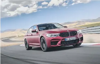  ??  ?? The next-generation BMW M5 features the first-ever M xDrive all-wheel-drive system that allows drivers to select 2WD or 4WD modes for supreme traction in all weather conditions.