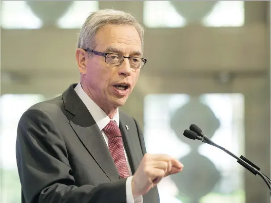  ?? NATIONAL POST/ FILES ?? Finance Minister Joe Oliver has said that he does not buy the recession thesis and reaffirmed that the federal Conservati­ves will run a budget surplus this year. But a report from the parliament­ary budget officer has contradict­ed him, saying it is...