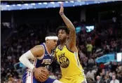  ?? ANDA CHU — BAY AREA NEWS GROUP, FILE ?? The Warriors’ Marquese Chriss (32) defends against the 76ers’ Tobias Harris (12) at Chase Center in March 2020.