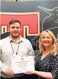  ??  ?? Proud
Fraser receives his certificat­e from Lisa Cameron