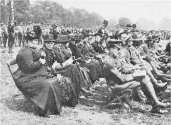  ?? (Historic Military Press) ?? ■ Some of the next-of-kin waiting to receive the honours won by family members.