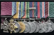  ?? SPINK & SON / THE CANADIAN PRESS ?? The Victoria Cross, the British Empire’s highest medal for bravery, and other medals awarded to Cpl. Colin Fraser Barron for his actions in the First World War.