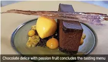  ?? ?? Chocolate delice with passion fruit concludes the tasting menu