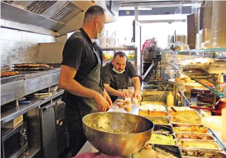  ?? AN photo by Sarah Glubb ?? Naama Restaurant and Butcher has closed its seating area and is only providing takeaway services during Ramadan and Eid.