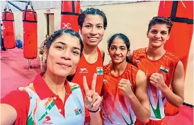  ?? ?? (from left) Boxers Nikhat Zareen, Lovlina Borgohain, Nitu and Jasmine strike a pose after securing berths on the Indian team for the Commonweal­th Games on Saturday.