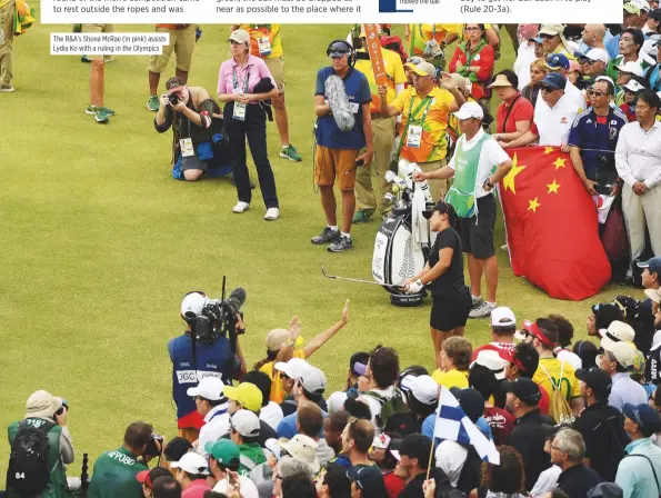  ??  ?? The R&amp;A’s Shona McRae (in pink) assists Lydia Ko with a ruling in the Olympics