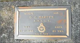  ??  ?? The newly restored war plaque of Martyn Douglas at Waihi Cemetery.