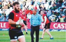  ?? AFP ?? England coach Eddie Jones watches during the warm-up of the second Test at the Free State Stadium in Bloemfonte­in.