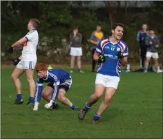  ??  ?? Richard Shaw celebrates scoring Naomh Eoin’s first goal.