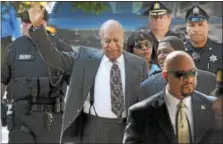  ?? DIGITAL FIRST MEDIA FILE PHOTO ?? Bill Cosby waves to spectators gathered to watch his arrival to the Montgomery County Courthouse in Norristown for his preliminar­y hearing on sexual assault May 24, 2016.