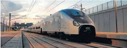  ?? R.C. ?? Un tren AVE construido por Talgo en circulació­n.