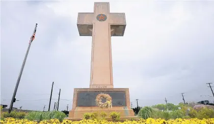  ?? ALGERINA PERNA/TNS ?? The Memorial Peace Cross located on state property in Bladensbur­g, Md., is the subject of a U.S. Supreme Court case about separation of church and state.