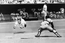  ?? ?? The Reds’ Pete Rose dives into home plate past the glove of Giants catcher Dave Rader in July 1972. Photograph: Bettmann/Bettmann Archive