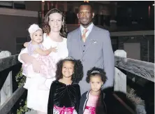  ??  ?? Alvin Beckley with his wife, Jacqui, and their three young daughters.