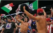  ?? Ronald Cortes / Contributo­r ?? Chivas fans cheer their team during Sunday’s game against Monterrey. The teams’ exhibition games were part of a preseason tour played in select U.S. cities.