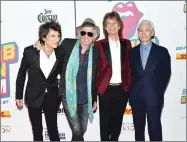  ?? AP FILE PHOTO BY EVAN AGOSTINI/INVISION ?? In this 2016 file photo, The Rolling Stones, from left, Ronnie Wood, Keith Richards, Mick Jagger and Charlie Watts attend the opening night party for "Exhibition­ism" at Industria in New York.