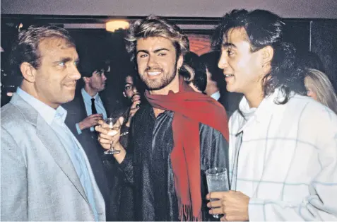  ?? ?? Simon NapierBell with George Michael and Andrew Ridgeley of Wham! in 1985