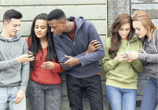  ??  ?? TECH SECRETS: Smartphone owners between the ages of 13 and 17 were found spending more than 23 hours a week on their phone, according to a 2016 Magid Media Futures study.