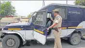  ?? BACHCHAN KUMAR/HT PHOTO ?? Senior police inspector, Ravindra Patil, checks the van from which the driver ran away with ₹82.50L cash.