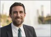  ?? DAMIAN DOVARGANES — THE ASSOCIATED PRESS ?? Kevin Paffrath, a real estate agent and YouTube content creator, poses at a campaign rally at Echo Park Lake in Los Angeles on Friday. Paffrath, 29, is one of the Democrats running in the recall against California Gov. Gavin Newsom.