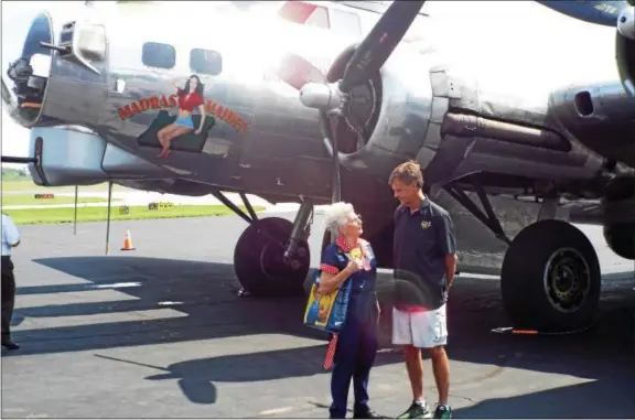  ?? PHOTO COURTESY OF PHILP STEIN ?? Pilot David Lyon and Mae Krier, a Rosie the Riveter, stand by the B-17 Flying Fortress.
