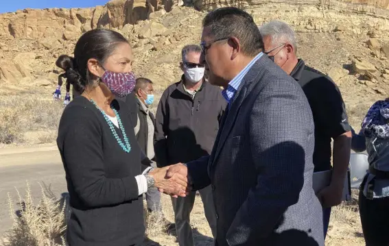  ?? Susan Montoya Bryan, AP file ?? Former Hopi Vice Chairman Clark Tenakhongv­a, right, talks with U.S. Interior Secretary Deb Haaland after a celebratio­n at Chaco Culture National Historical Park in northweste­rn New Mexico in November.