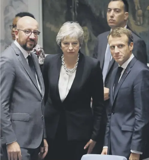  ??  ?? 0 French president Emmanuel Macron, right, with Mrs May and Belgian premier Charles Michel at a United Nations meeting in New York