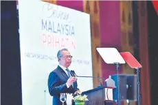  ?? — Bernama photo ?? Muhyiddin says the country’s economic recovery will also be led by the services and manufactur­ing sectors which contribute more than 80 per cent of the GDP.