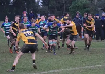  ??  ?? Adrian Copeland on his way to scoring a try for Gorey in Sunday’s seconds cup replay.