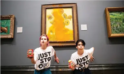  ?? Photograph: Antonio Olmos/The Guardian ?? Just Stop Oil protesters glued themselves to the wall of the National Gallery in London and threw tomato soup at Vincent Van Gogh’s Sunflowers on 14 October 2022.