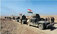  ?? AP/PTI ?? Iraq's elite counterter­rorism forces patrol outside the town of Bartella in Iraq. Iraqi forces retook Bartella, 15 km east of Mosul, earlier last week