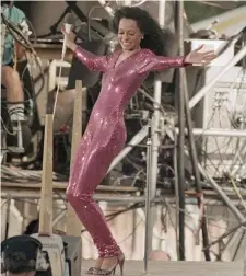  ?? AP File ?? LARGER THAN LIFE: Diana Ross sparkles in a formfittin­g pink jumpsuit.